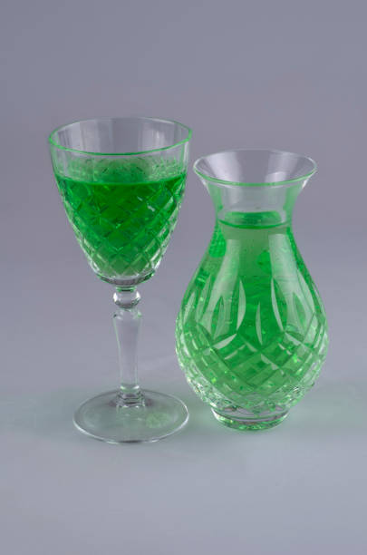 vase and sherry glass with green food dye