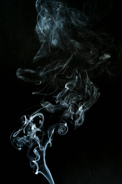 istock smoke cloud with black background. fog texture 1290031800