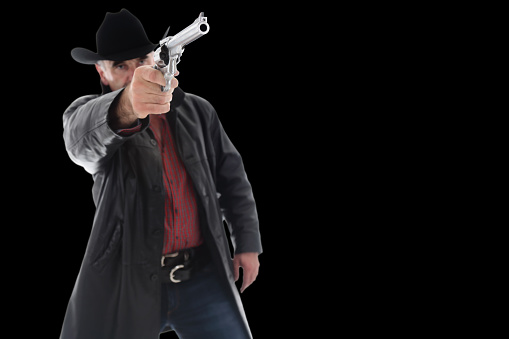 Gunslinger, isolated on black background