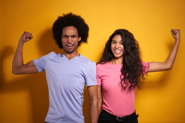 istock Afroamerican couple showing their strength 1290032726