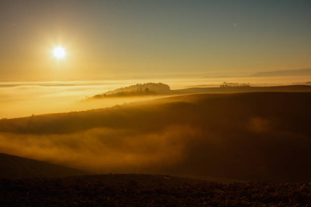 istock landscape with hills and fog 1290034041