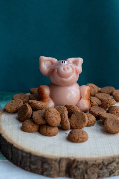 istock Marzipan pig with many pepernoten cookies 1290038965