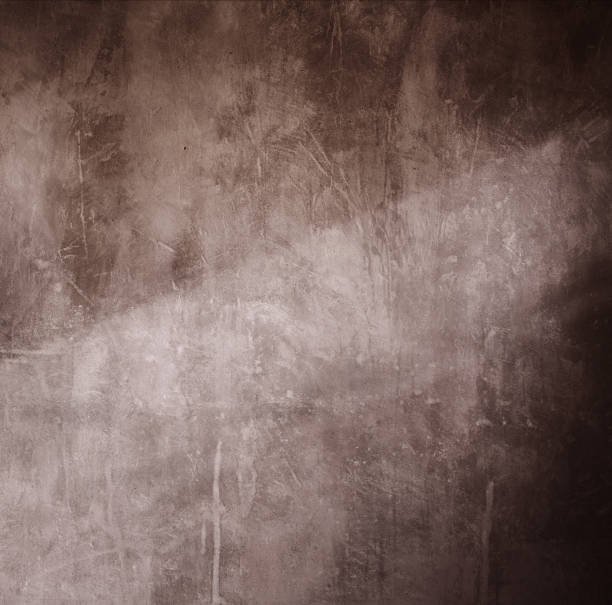 istock background of brown old cement grunge wall 1290039040