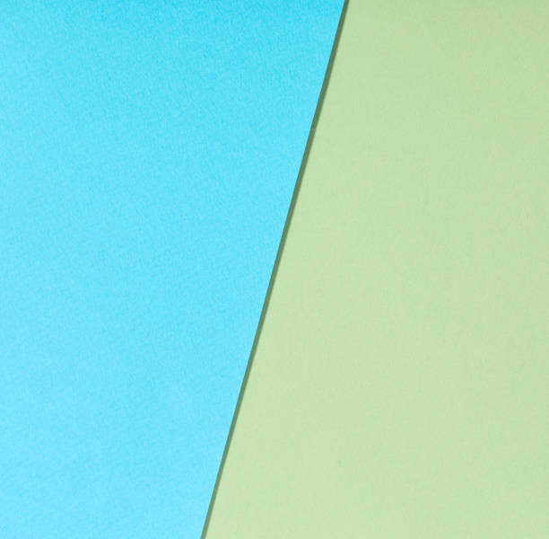 istock blue and green paper background 1290039075