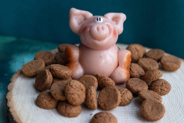 istock Marzipan pig with many pepernoten cookies 1290039702