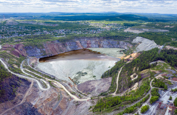 istock Panorama of a quarry for mining. View from above. 1290040118