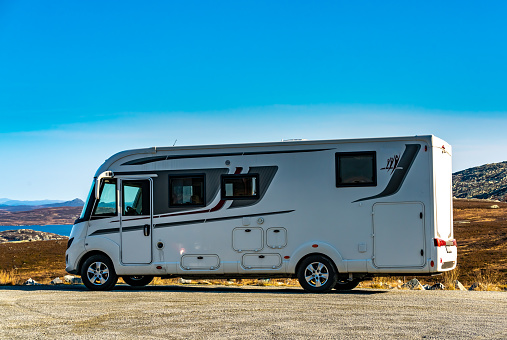 RV camper van parked in the mountains.