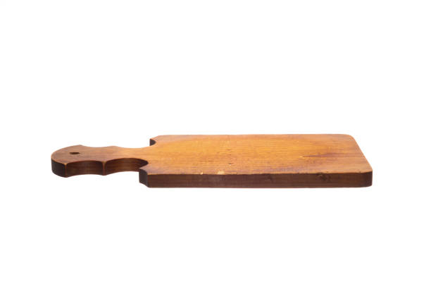 istock Old vintage kitchen board. Isolated on white background. 1290042201