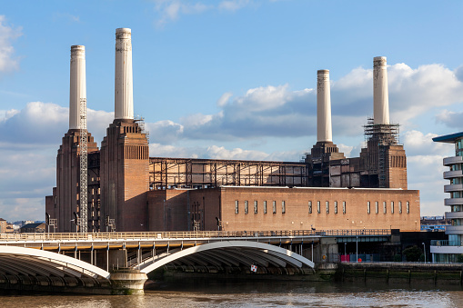 Battersea Power Station in London England UK a coal fired building built in 1935 now decommissioned and being redeveloped on the bank of the River Thames, stock photo image