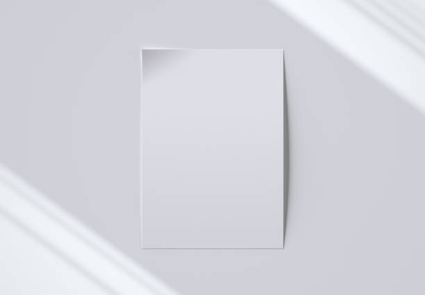 istock A4 Paper Mockup With Realistic Shadows Overlay Effect. 3D render. 1290046572