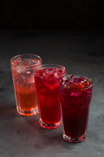 istock Various summer cocktails on black background 1290049839
