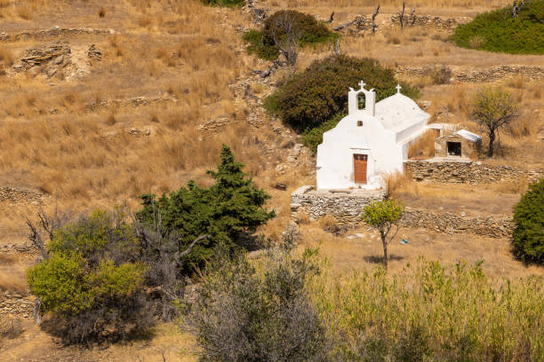 istock Traditional white chapel , Ios island, Greece. 1290050930