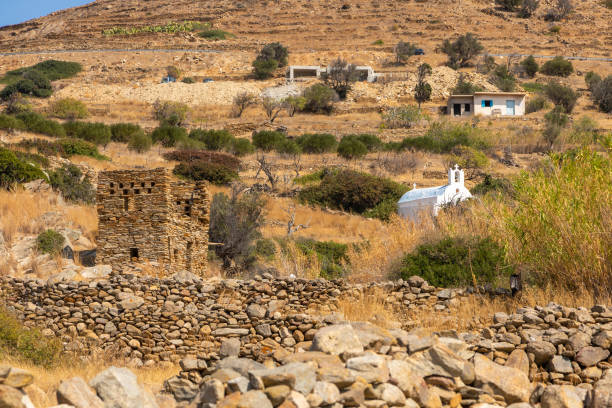 istock Traditional white chapel , Ios island, Greece. 1290051016