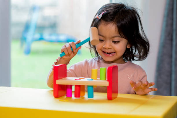 istock Toddler Playing With an Early Learning Toy 1290051647