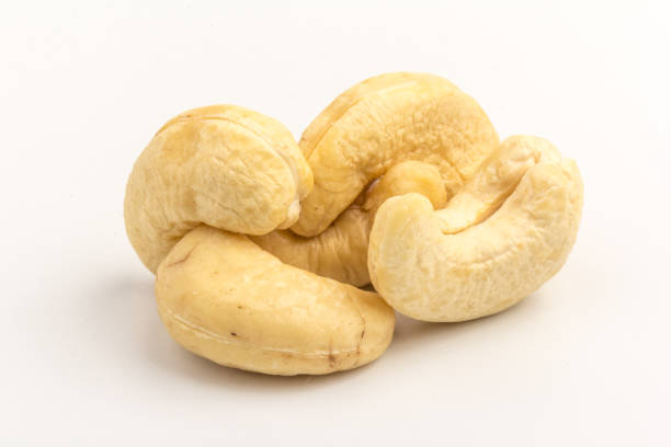 istock Raw cashew nuts isolated on white background. 1290053962