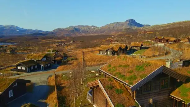 Large luxury cabins with grass turf roofs. Beitostølen, Norway.