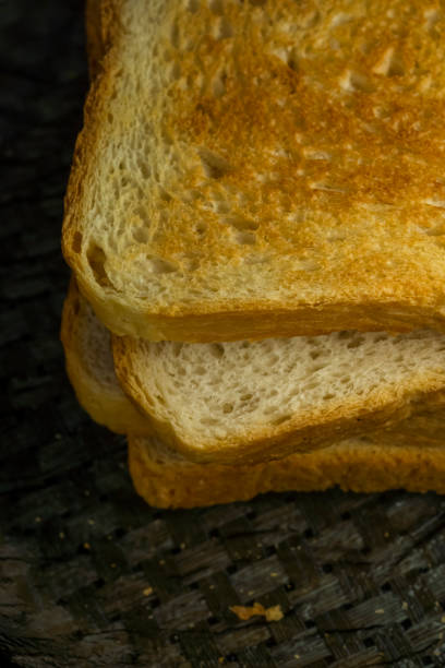 istock Ruddy toasts for breakfast are on table, vertical 1290054224