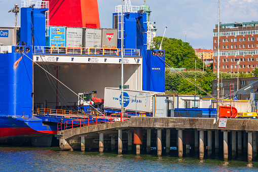 Gothenburg, Sweden - May 22, 2015: Loading of containers on a ship in a port