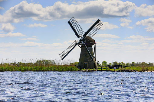 typical Dutch windmill along the Kagerplassen, a system of peat lakes in the north of the province of South Holland, which is used as a recreation area and fishing ground; Warmond, Netherlands