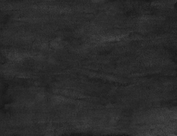 istock Watercolor grunge black background texture. Dark monochrome backdrop overlay. Abstract old watercolour painting. Stains on paper. 1290059689
