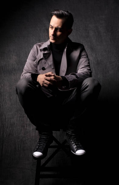 male model with dark grey background stock photo