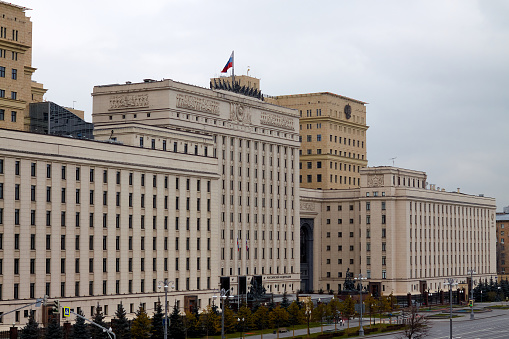 One of the old stalinist skyscraper at Moscow under overcast sunset sky