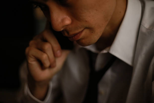 istock Male fraud image to call 1290064123