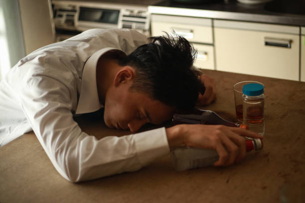 istock A man who gets drunk and sleeps 1290067188
