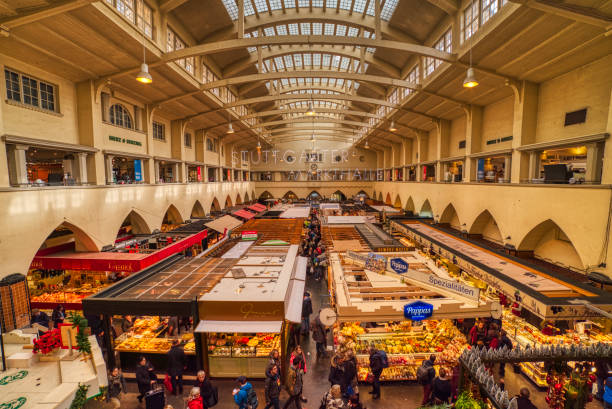 Indoor view of the Stuttgarter Markthalle building with its stalls bursting with life as gourmet food is served at the kiosks Stuttgart, Germany - November 11 2019
Indoor view of the Stuttgarter Markthalle (market hall) building with its shops and stalls bursting with life. Gourmet food, delicatessen are served at the kiosks market hall stock pictures, royalty-free photos & images