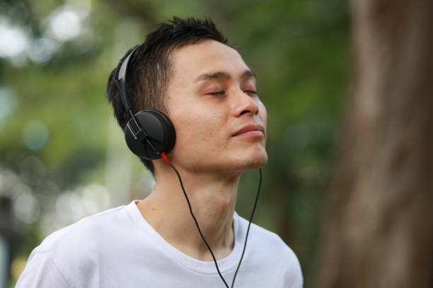 istock Man listening to music 1290068690