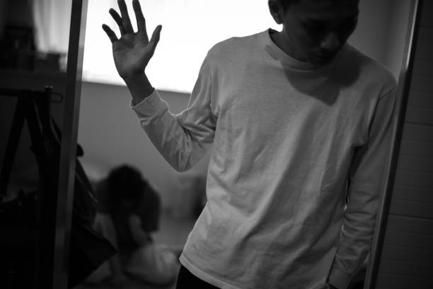 istock Man leaving the room 1290069795