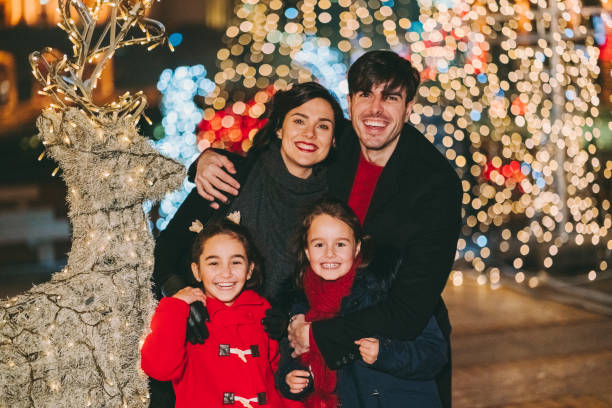 istock Family outside at Christmas night 1290071920