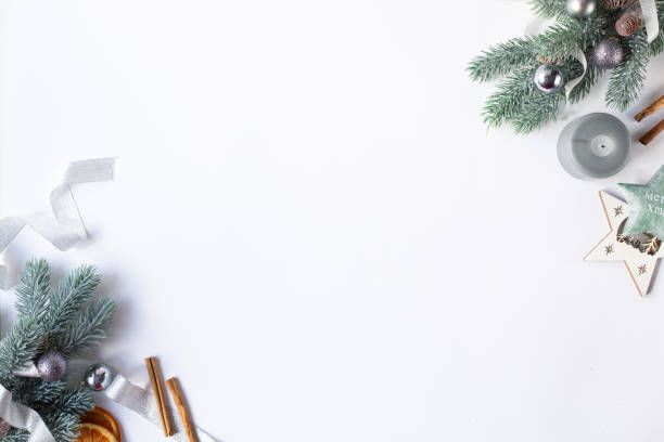 istock Beautiful Christmas decorations and fir branches on a white background. 1290072778
