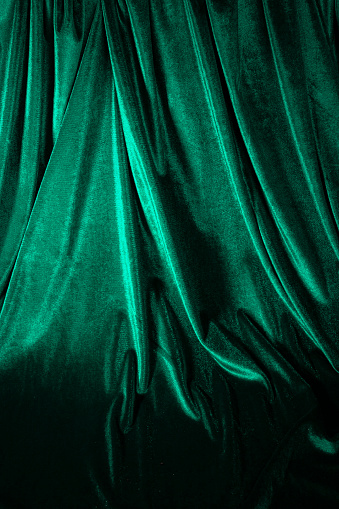 Luxurious cloth background of velvet, velor fabric in trendy color.