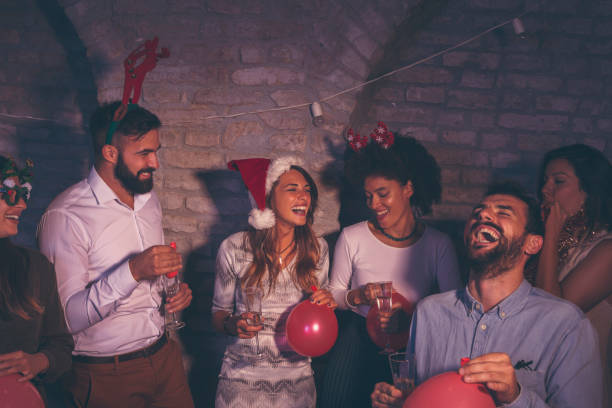 istock Friends having fun at New Year's party 1290079299