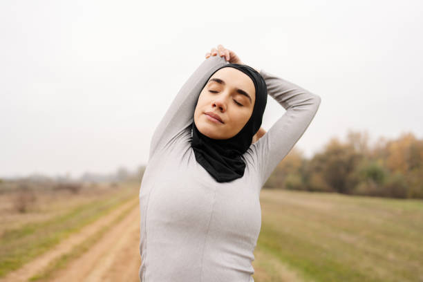istock Woman with a hijab during training 1290084442