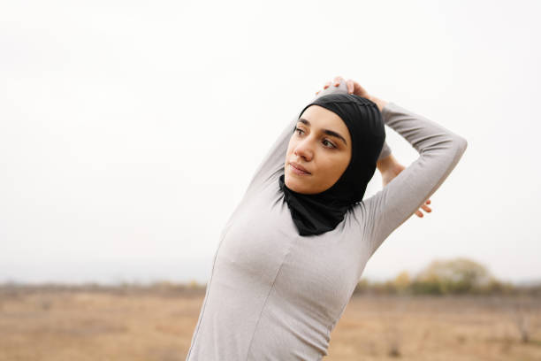 istock Woman with a hijab during training 1290084446
