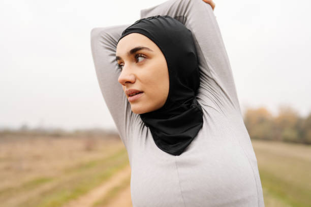 istock Woman with a hijab during training 1290084542