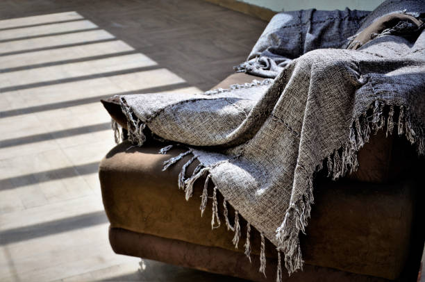 istock Sofa with plaid in gazebo 1290084930