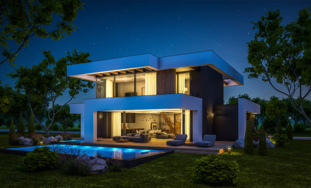 istock 3d rendering of modern house in luxurious style in night 1290086745
