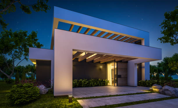 istock 3d rendering of modern house in luxurious style in night 1290086790