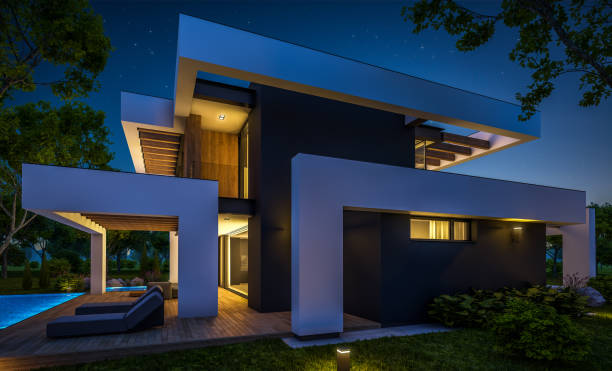 istock 3d rendering of modern house in luxurious style in night 1290086807
