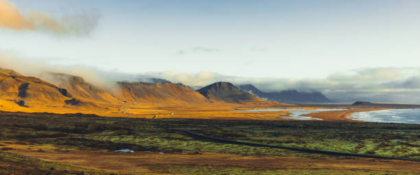 istock Dramatic panoramic volcanic landscape of planet Iceland during sunset 1290086840
