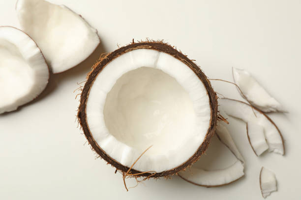 istock Fresh tasty coconut on white background, top view 1290090591