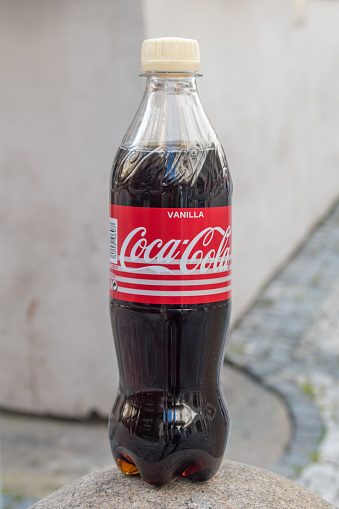 Prague, Czech Republic - July 10, 2020: Bottle of Coca-Cola Vanilla. Coca-Cola or Coke is a carbonated soft drink produced by The Coca-Cola Company.
