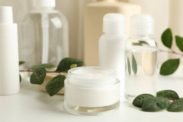 istock Spa cosmetic products on white table, close up 1290091980