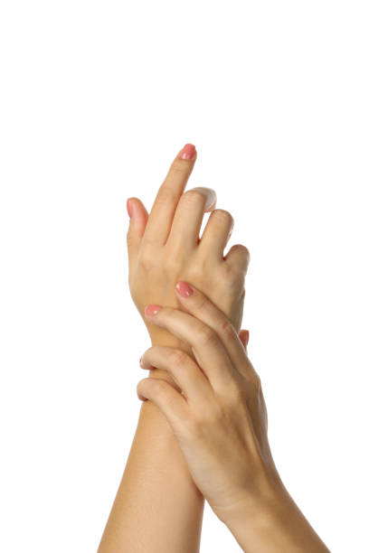 istock Cute female hands with pink manicure isolated on white background 1290092336