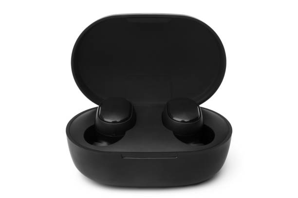 istock Black wireless earbuds inside power bank case 1290093089
