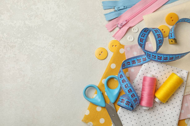 istock Sewing supplies on white background, space for text 1290093456