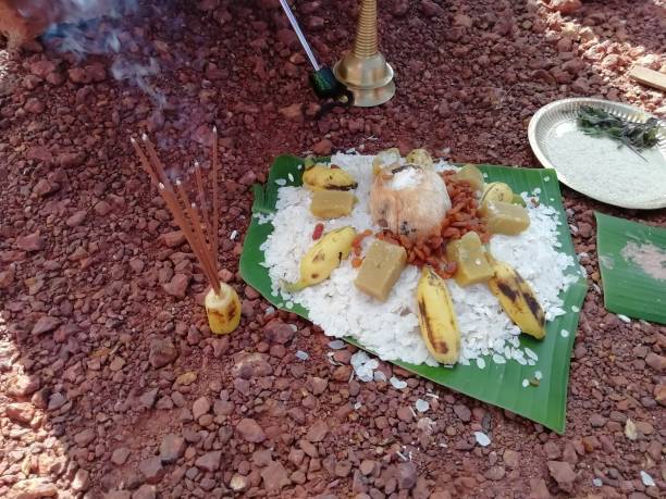 Traditional Hindu pooja function dishes over banana leaves